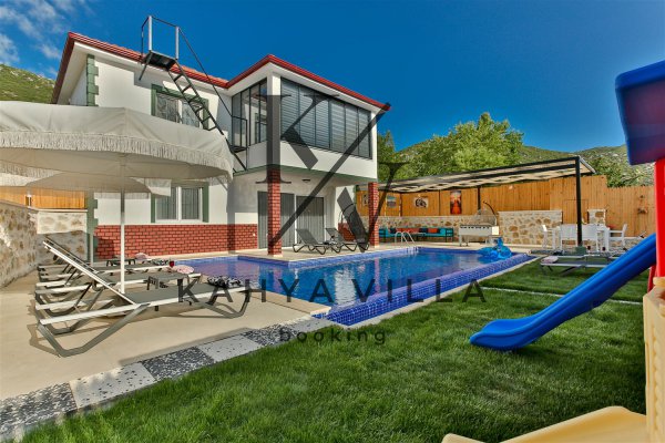 Villa Doğan Bezirgan | Kalkan’da 8 Kişilik, Korunaklı ve Özel Havuzlu Tatil Villası